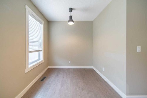 941 Mckenzie Towne Manor Se, Calgary, AB - Indoor Photo Showing Other Room