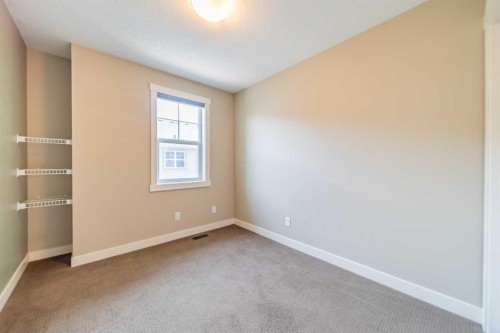 941 Mckenzie Towne Manor Se, Calgary, AB - Indoor Photo Showing Other Room