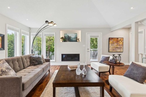 58 Candle Terrace Sw, Calgary, AB - Indoor Photo Showing Living Room With Fireplace