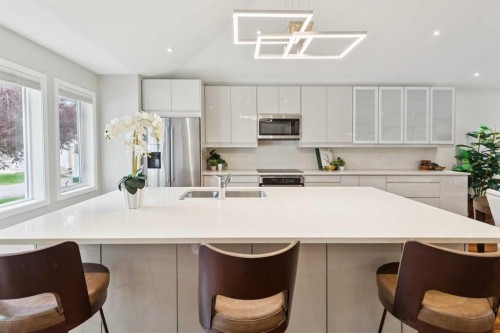 58 Candle Terrace Sw, Calgary, AB - Indoor Photo Showing Kitchen With Double Sink With Upgraded Kitchen