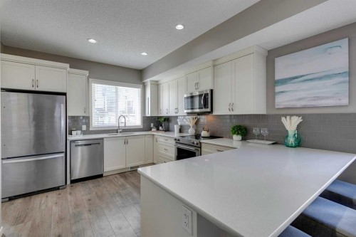 510 Nolanlake Villas Nw, Calgary, AB - Indoor Photo Showing Kitchen With Stainless Steel Kitchen