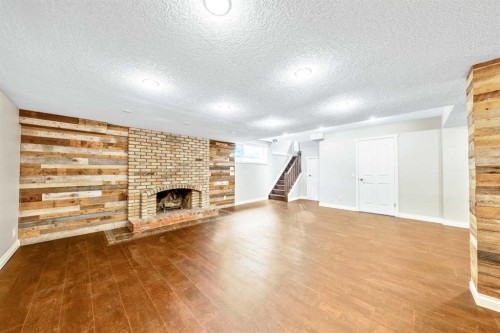 224 Varsity Crescent Nw, Calgary, AB - Indoor With Fireplace