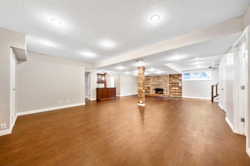 224 Varsity Crescent Nw, Calgary, AB - Indoor With Fireplace