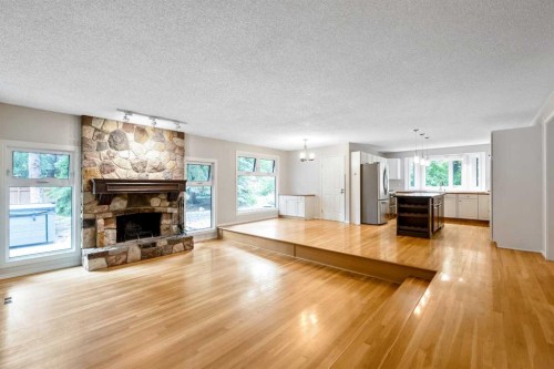 224 Varsity Crescent Nw, Calgary, AB - Indoor Photo Showing Living Room With Fireplace
