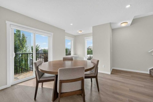 709-474 Seton Circle Se, Calgary, AB - Indoor Photo Showing Dining Room