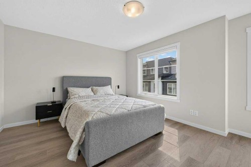 709-474 Seton Circle Se, Calgary, AB - Indoor Photo Showing Bedroom