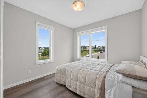 709-474 Seton Circle Se, Calgary, AB - Indoor Photo Showing Bedroom