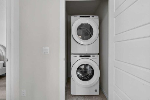 709-474 Seton Circle Se, Calgary, AB - Indoor Photo Showing Laundry Room