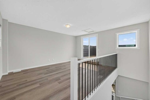 709-474 Seton Circle Se, Calgary, AB - Indoor Photo Showing Other Room