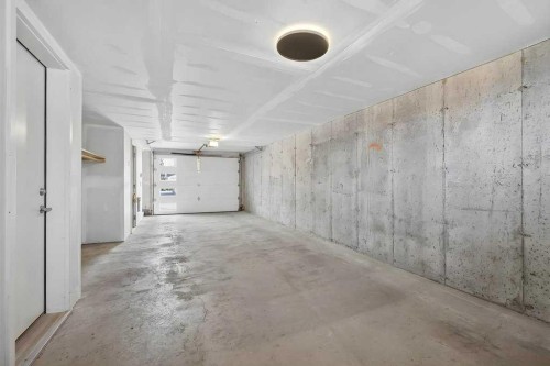 709-474 Seton Circle Se, Calgary, AB - Indoor Photo Showing Garage