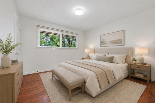 248 Parkland Crescent Se, Calgary, AB - Indoor Photo Showing Bedroom