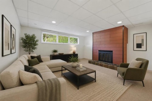 248 Parkland Crescent Se, Calgary, AB - Indoor Photo Showing Living Room With Fireplace