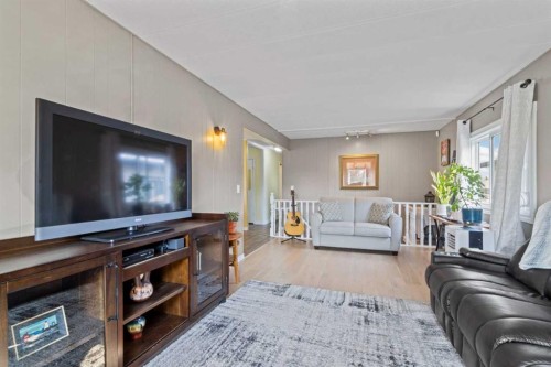 113 Spring Haven Court Se, Airdrie, AB - Indoor Photo Showing Living Room