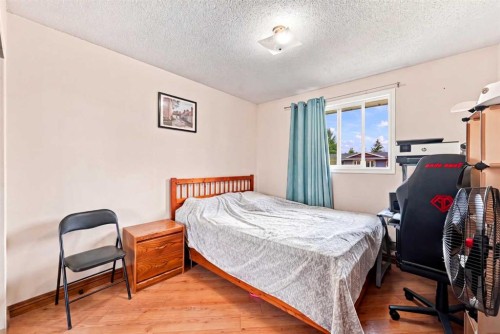 619 Whiteridge Road Ne, Calgary, AB - Indoor Photo Showing Bedroom