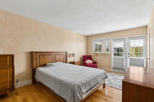 1824 Lake Bonavista Drive Se, Calgary, AB - Indoor Photo Showing Bedroom