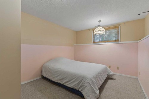 1824 Lake Bonavista Drive Se, Calgary, AB - Indoor Photo Showing Bedroom