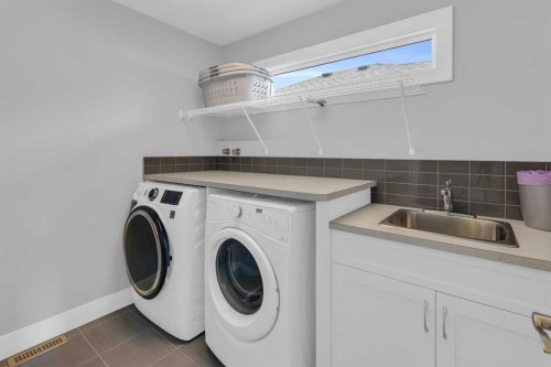 286 Nolan Hill Boulevard Nw, Calgary, AB - Indoor Photo Showing Laundry Room