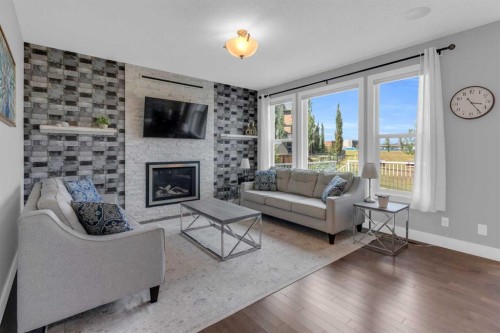 286 Nolan Hill Boulevard Nw, Calgary, AB - Indoor Photo Showing Living Room With Fireplace
