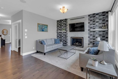 286 Nolan Hill Boulevard Nw, Calgary, AB - Indoor Photo Showing Living Room With Fireplace