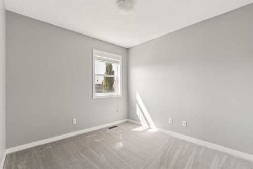 1037 New Brighton Park Se, Calgary, AB - Indoor Photo Showing Other Room