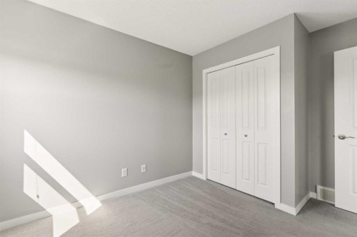 1037 New Brighton Park Se, Calgary, AB - Indoor Photo Showing Other Room