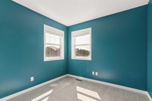 1037 New Brighton Park Se, Calgary, AB - Indoor Photo Showing Other Room