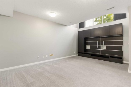 1037 New Brighton Park Se, Calgary, AB - Indoor Photo Showing Other Room