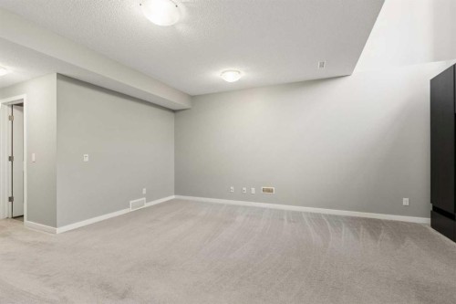 1037 New Brighton Park Se, Calgary, AB - Indoor Photo Showing Other Room