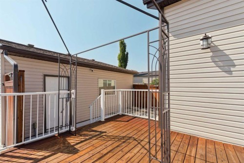 1037 New Brighton Park Se, Calgary, AB - Outdoor With Deck Patio Veranda With Exterior