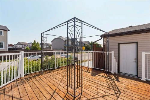 1037 New Brighton Park Se, Calgary, AB - Outdoor With Deck Patio Veranda With Exterior