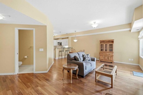 2144-48 Inverness Gate Se, Calgary, AB - Indoor Photo Showing Living Room