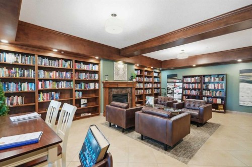2144-48 Inverness Gate Se, Calgary, AB - Indoor With Fireplace