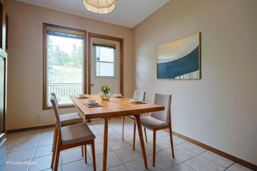 52 Edgeland Road Nw, Calgary, AB - Indoor Photo Showing Dining Room