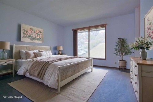 52 Edgeland Road Nw, Calgary, AB - Indoor Photo Showing Bedroom