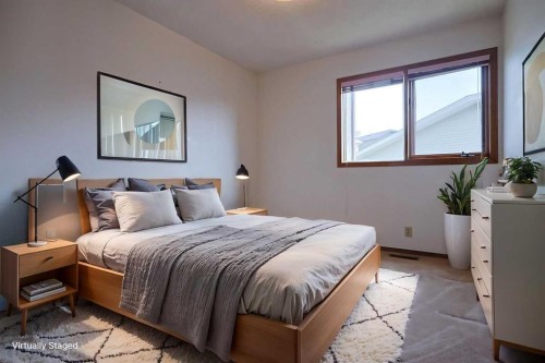 52 Edgeland Road Nw, Calgary, AB - Indoor Photo Showing Bedroom