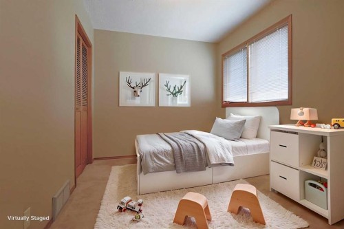 52 Edgeland Road Nw, Calgary, AB - Indoor Photo Showing Bedroom