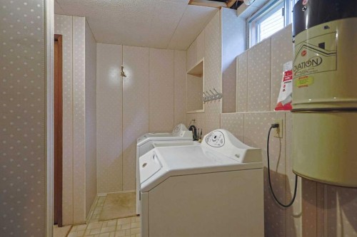 52 Edgeland Road Nw, Calgary, AB - Indoor Photo Showing Laundry Room