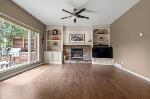 58 Mt Gibraltar Place Se, Calgary, AB - Indoor Photo Showing Living Room With Fireplace