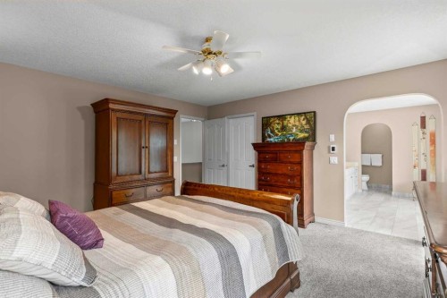 58 Mt Gibraltar Place Se, Calgary, AB - Indoor Photo Showing Bedroom