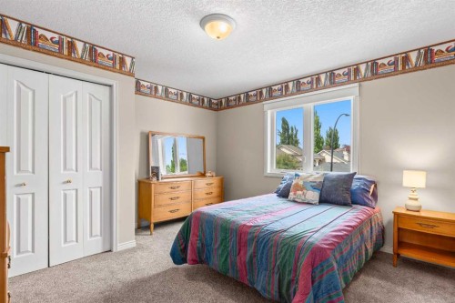 58 Mt Gibraltar Place Se, Calgary, AB - Indoor Photo Showing Bedroom