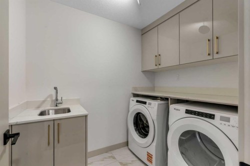 414 Corner Meadows Square Ne, Calgary, AB - Indoor Photo Showing Laundry Room