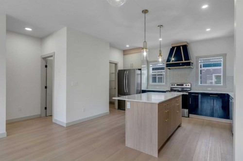 414 Corner Meadows Square Ne, Calgary, AB - Indoor Photo Showing Kitchen With Upgraded Kitchen