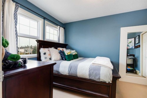 1437 Kings Heights Boulevard Se, Airdrie, AB - Indoor Photo Showing Bedroom