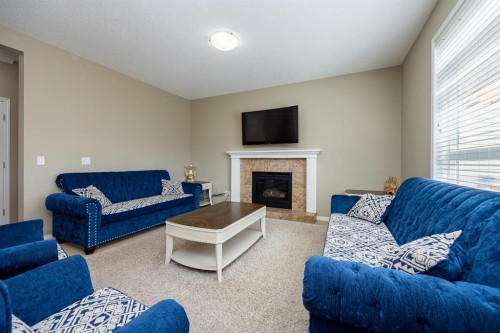 462 Williamstown Green Nw, Airdrie, AB - Indoor Photo Showing Living Room With Fireplace