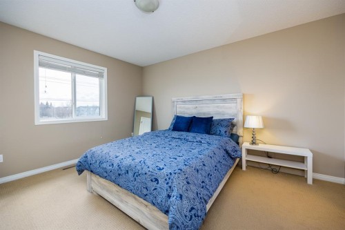 462 Williamstown Green Nw, Airdrie, AB - Indoor Photo Showing Bedroom