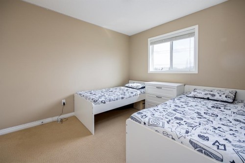 462 Williamstown Green Nw, Airdrie, AB - Indoor Photo Showing Bedroom
