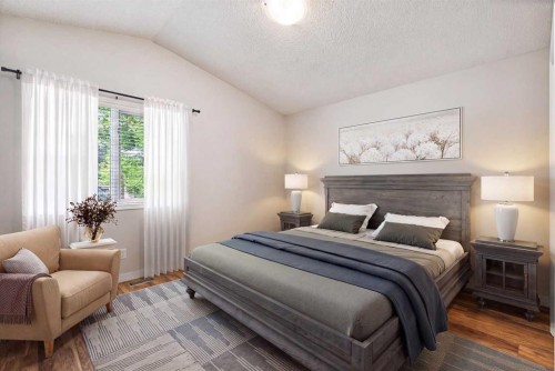 159 Woodbend Way, Okotoks, AB - Indoor Photo Showing Bedroom