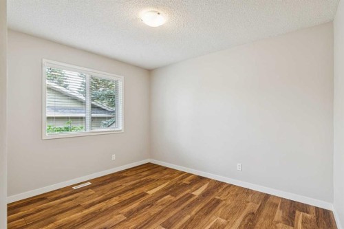 159 Woodbend Way, Okotoks, AB - Indoor Photo Showing Other Room