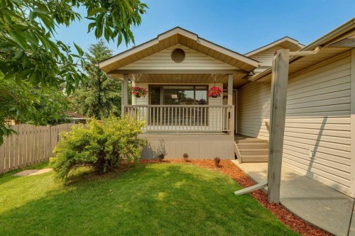 159 Woodbend Way, Okotoks, AB - Outdoor With Deck Patio Veranda