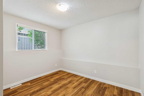 159 Woodbend Way, Okotoks, AB - Indoor Photo Showing Other Room
